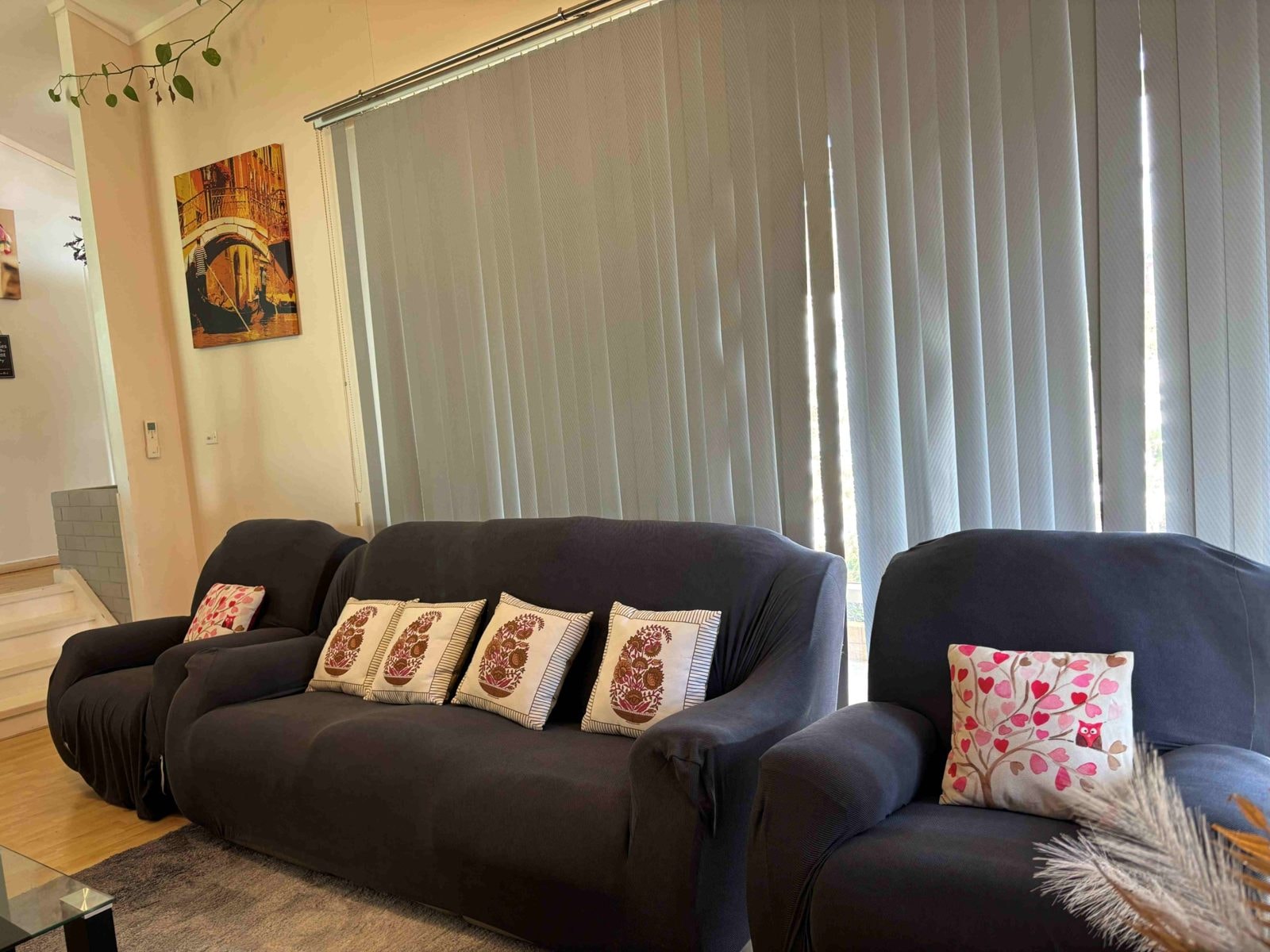 Lounge room of a CISP SIL home with comfortable sofas and natural light
